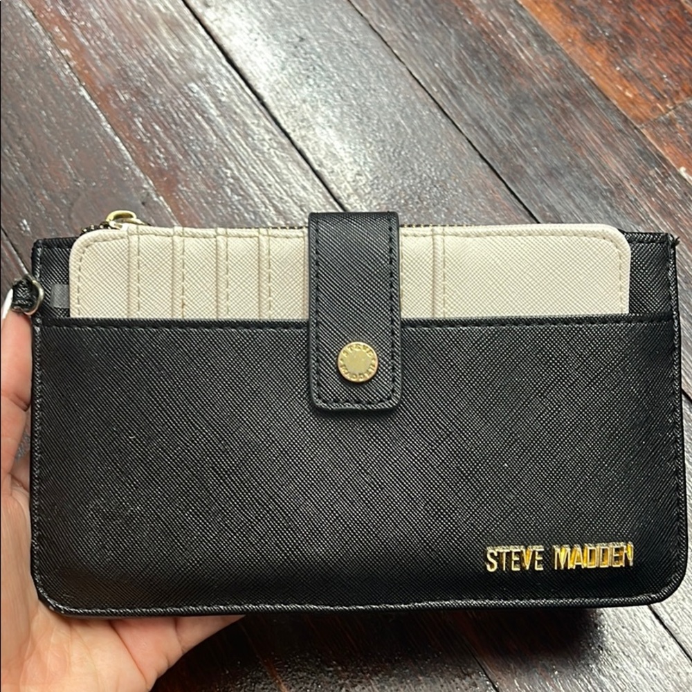 Black and light pink Steve Madden Clutch.